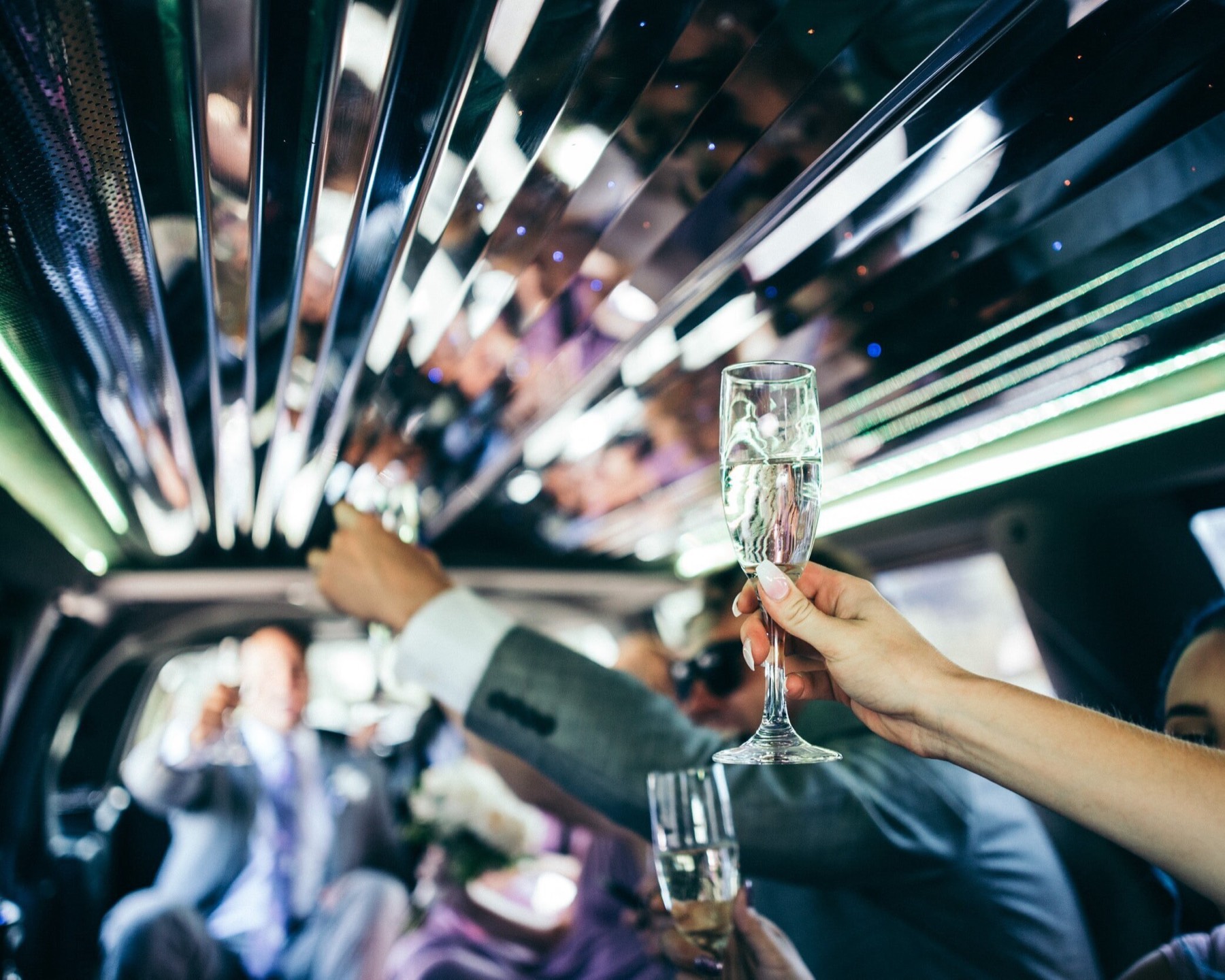 Champagne toast inside the limousine